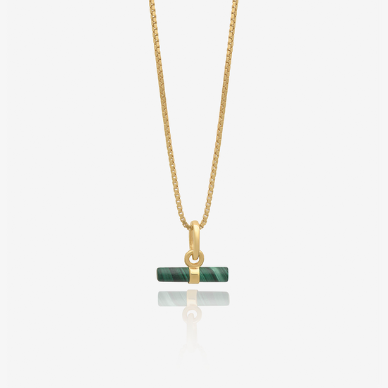 malachite rectangular pendant on a delicate gold chain and a gold ring from rachel jackson