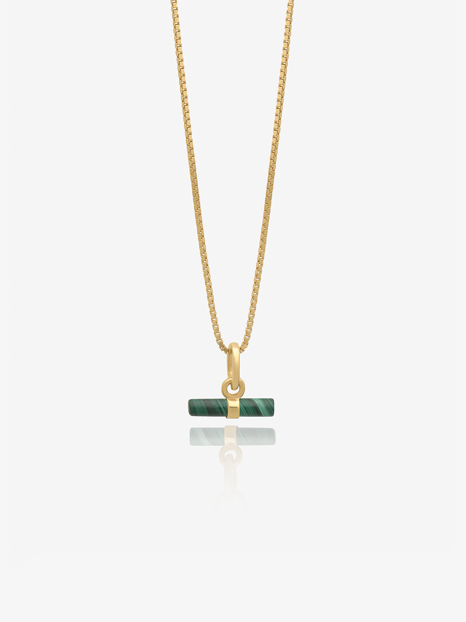 malachite rectangular pendant on a delicate gold chain and a gold ring from rachel jackson