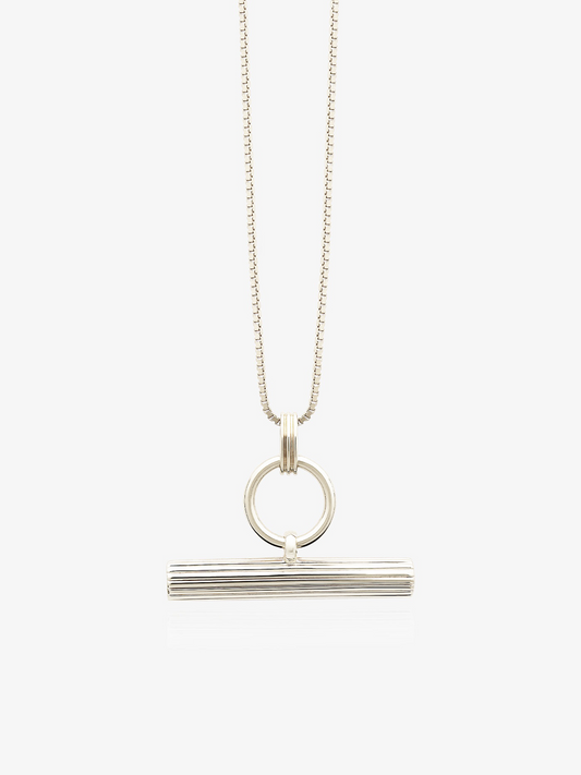 silver necklace with t bar and a circle necklace on a delicate silver chain from rachel jackson
