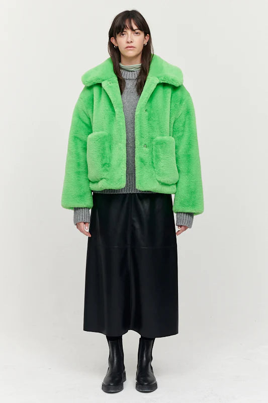 Neon green short faux fur jacket with two front patch pockets