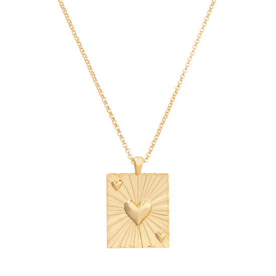 Gold necklace with rectangular gold pendant with embossed heart