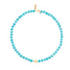 Turquoise colour beaded necklace with single gold plated nugget and lobster catch