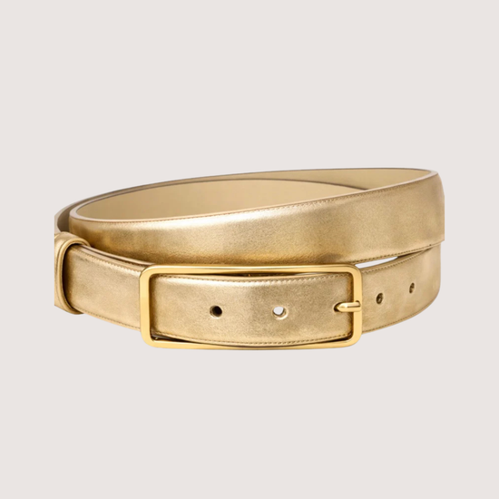 Gold belt on a light beige background