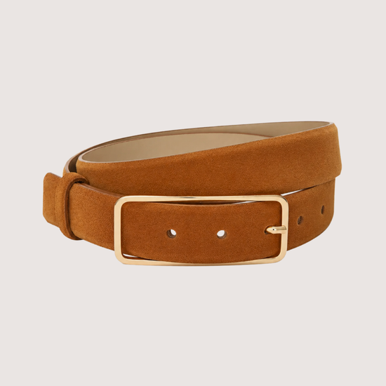 Brown leather belt with a gold buckle on a light gray background