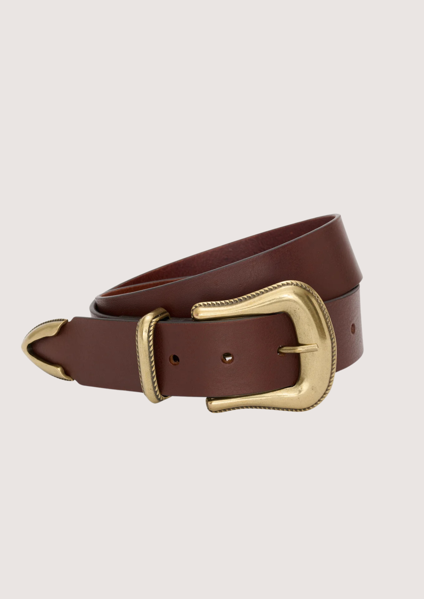 Brown leather belt with a gold buckle on a beige background