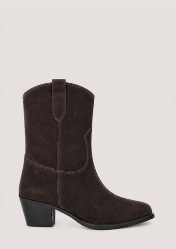 A dark brown suede western-style ankle boot with a low block heel, shown from a side profile against a light gray background.