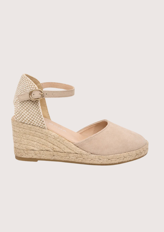 Beige wedge sandal with espadrille sole on a white background