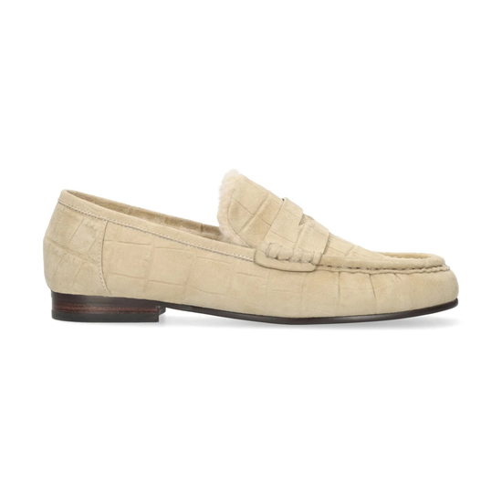 beige suede loafer with fuzzy interior and dark brown sole, on a white background