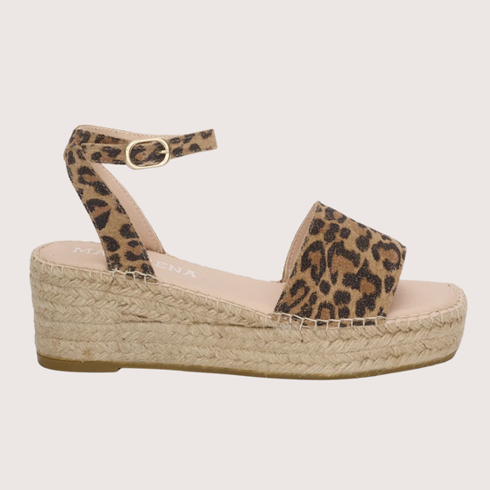 Leopard print wedge sandal on a light gray background