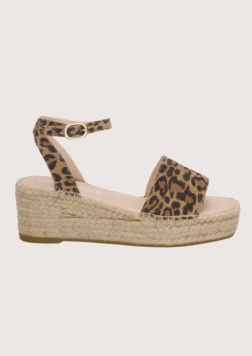 Leopard print wedge sandal on a light gray background