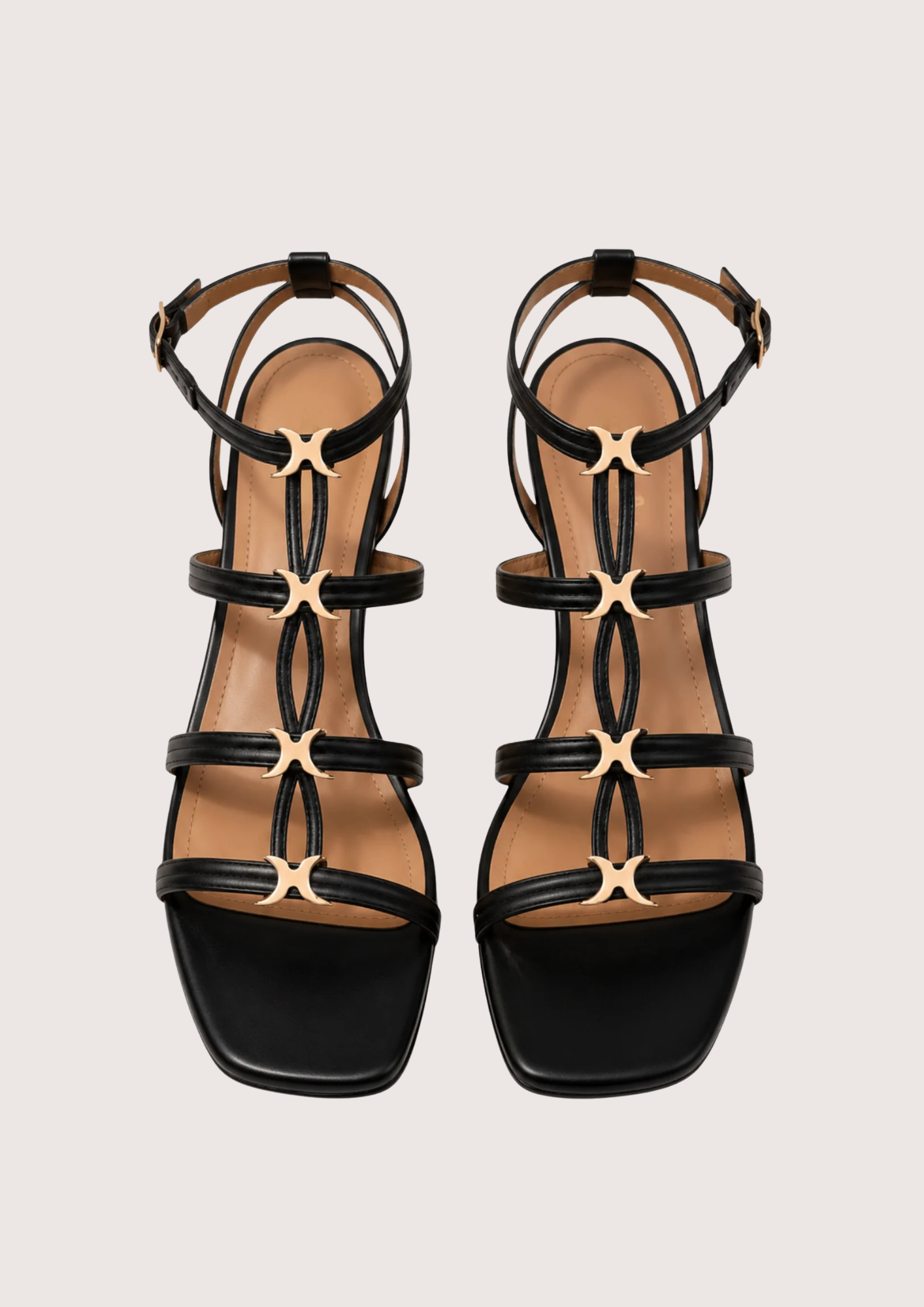 black sandal with gold hardware