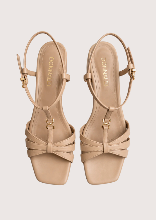 Nude sandal on a white background