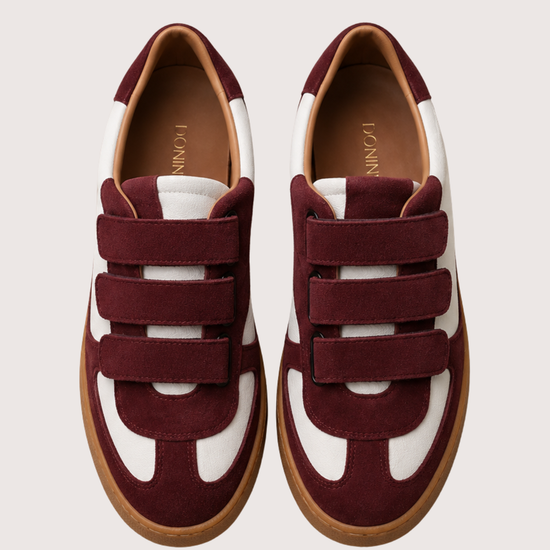burgundy and white velcro trainer on a white background