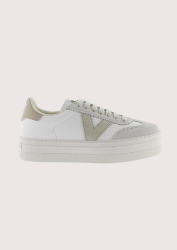 white platform trainers with beige suede v on side 