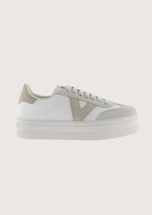 white platform trainers with beige suede v on side 