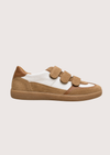 tan trainer with velcro straps on a white background