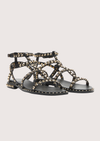Black sandal with gold studs on a white background alternate view