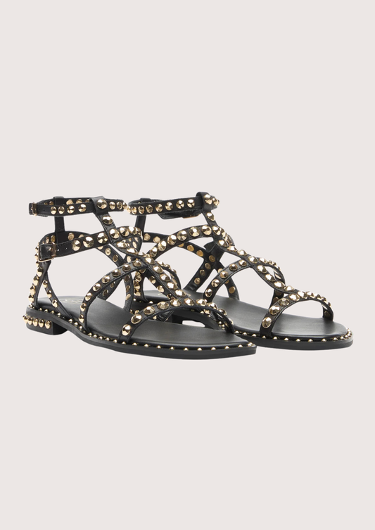 Black sandal with gold studs on a white background alternate view