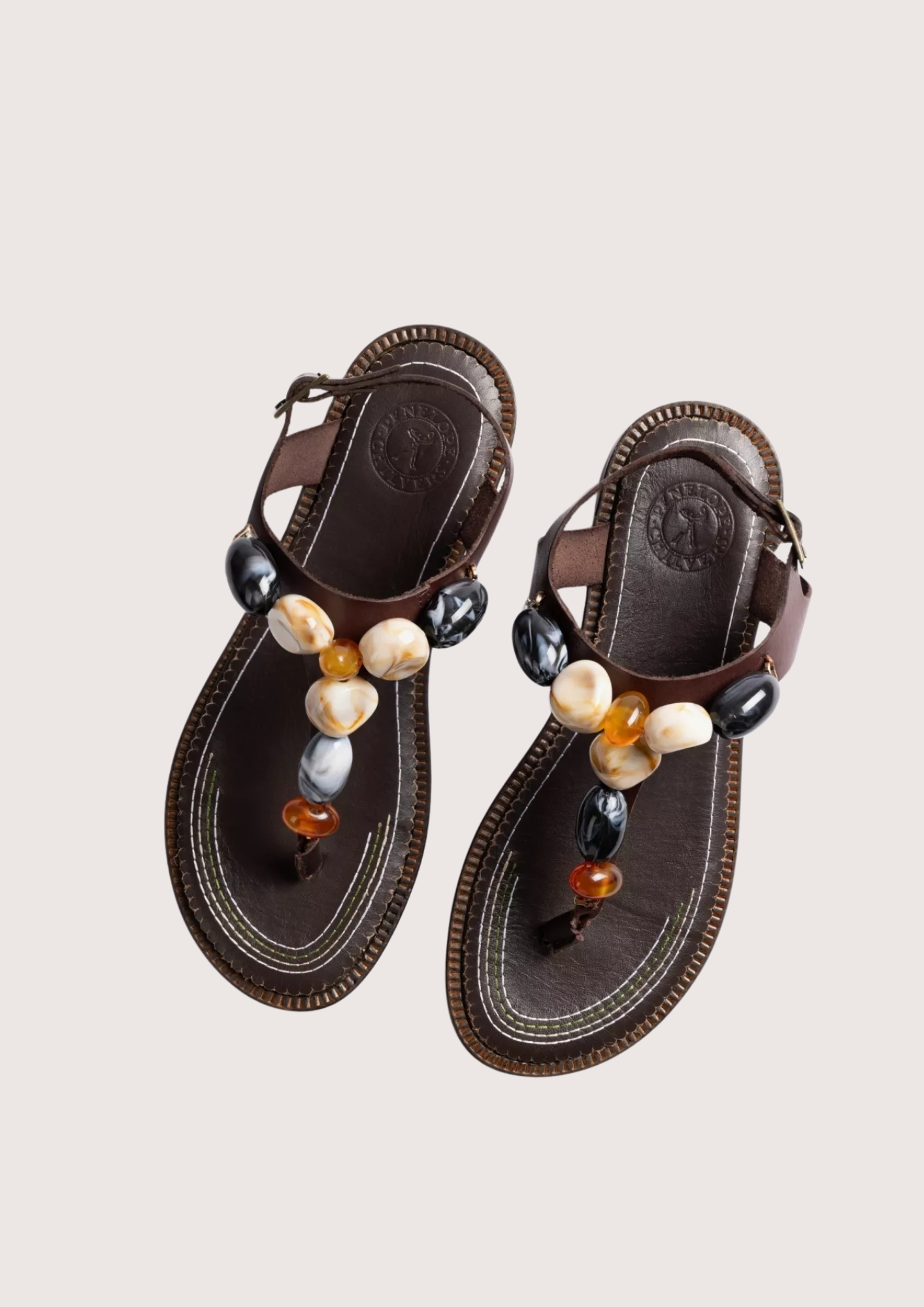 brown sandal with stone detail birds eye view