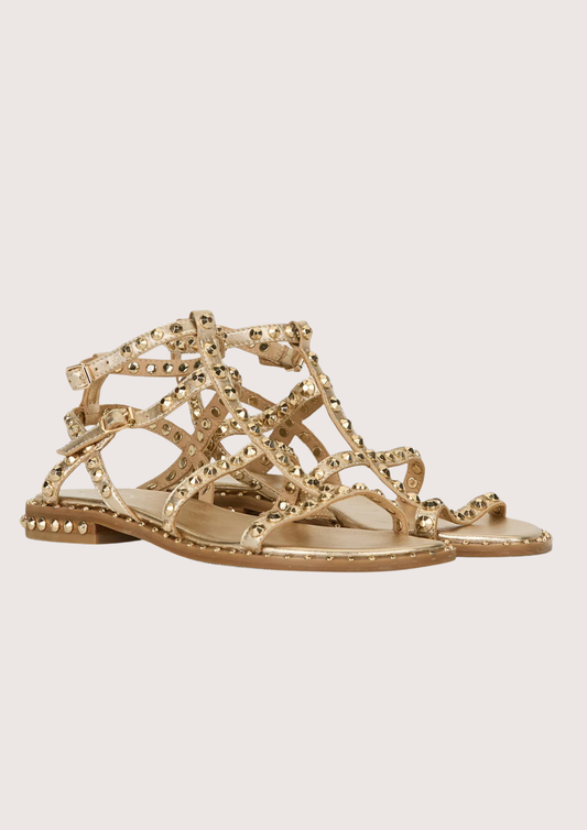 Gold sandal with gold studs on a white background alternate angle