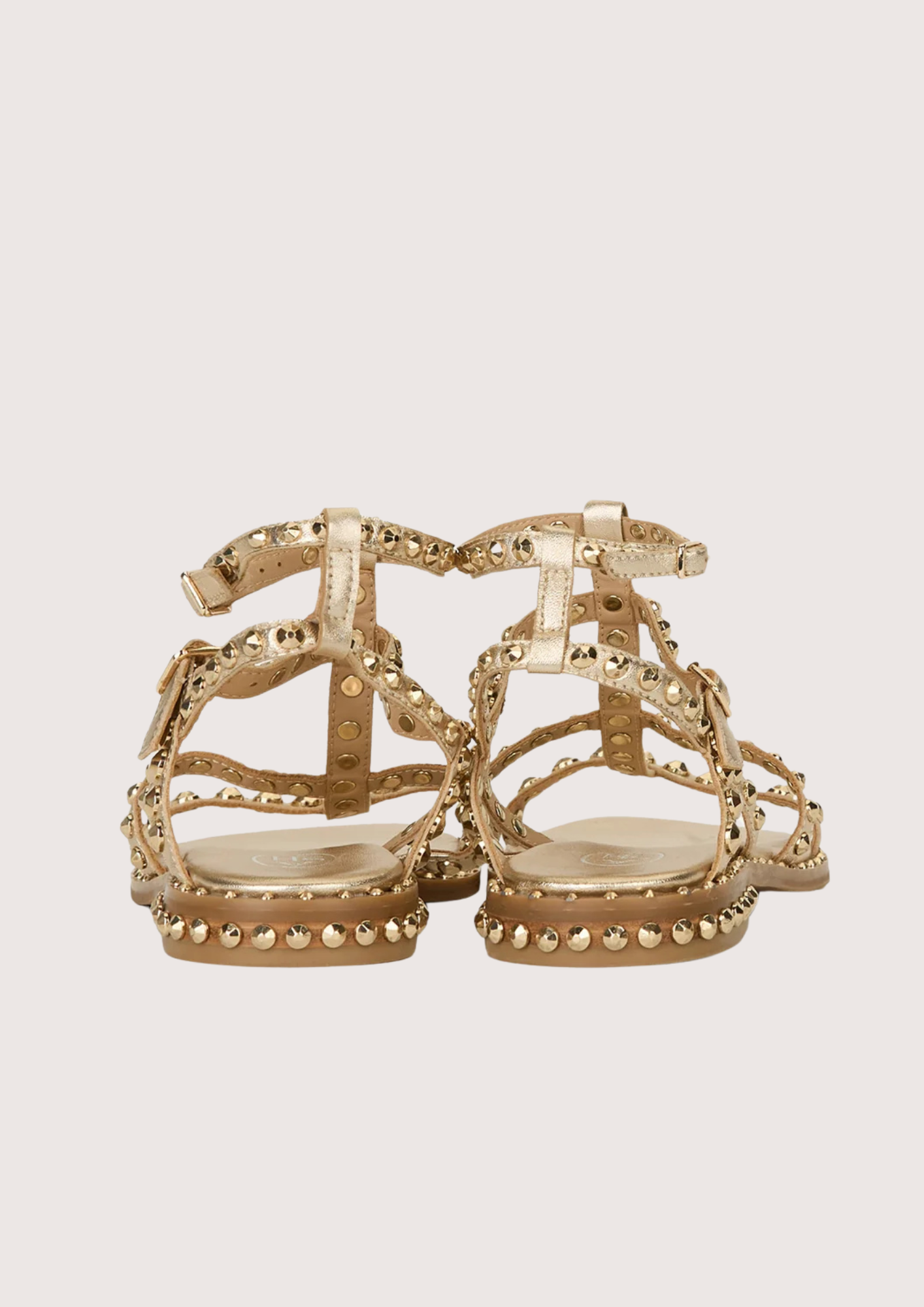 Gold sandal with gold studs on a white background alternate angle