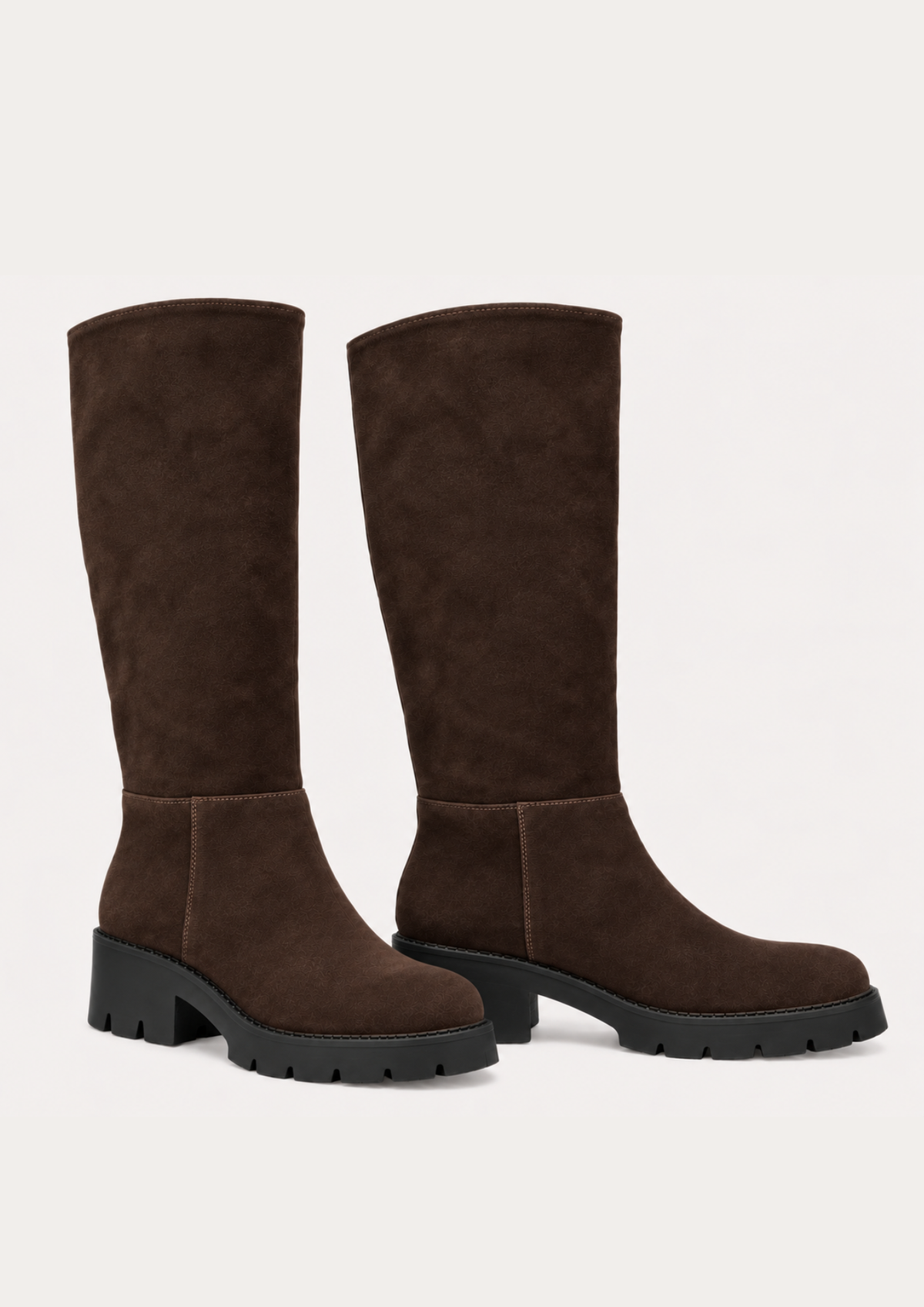 A pair of dark brown suede knee-high boots with chunky black block heels, shown against a plain off-white background.