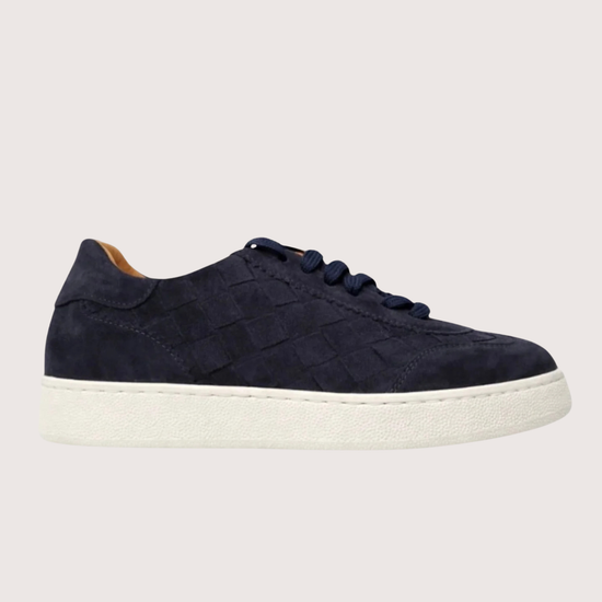 Navy woven trainer on a white background