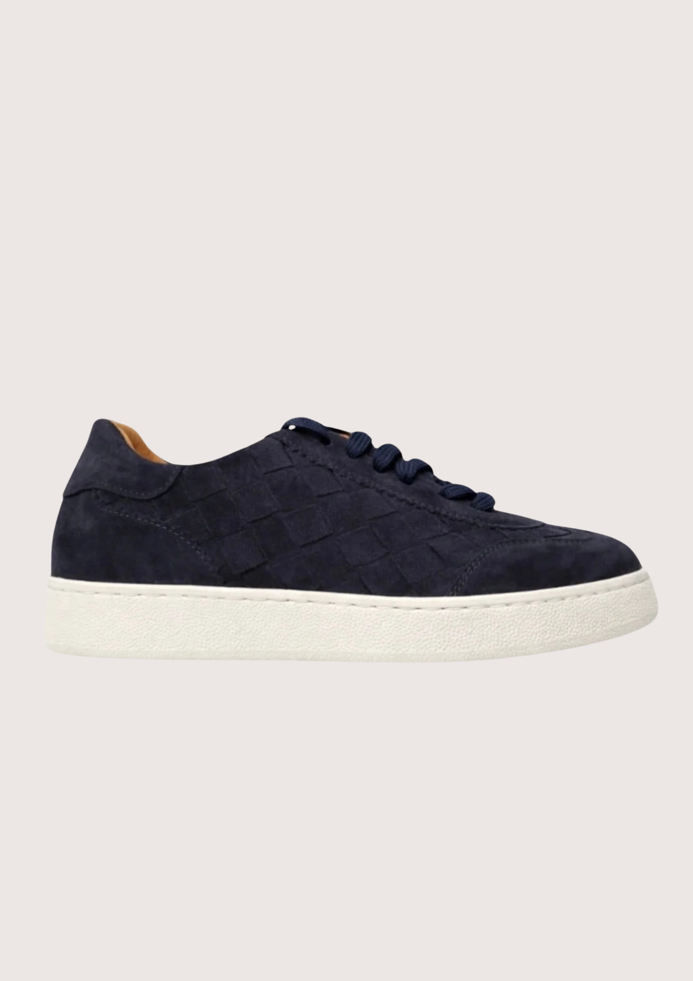 Navy woven trainer on a white background