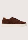 Woven brown trainer on a white background