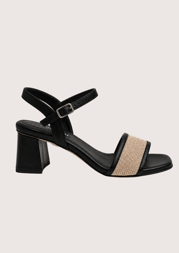 Black block heel sandal with a raffia toe on a white background