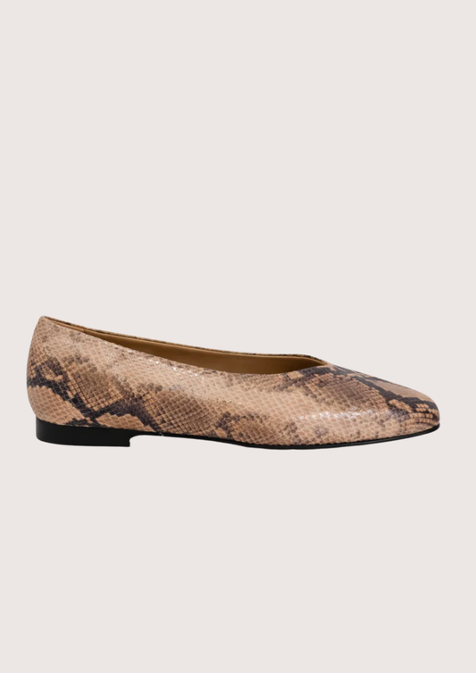 Snake print flat shoe on a light background