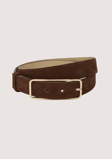 brown suede belt with gold hardware on plain background