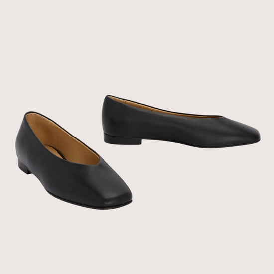 Black leather ballet flats with squared toe and v shaped toe shape from donna lei 
