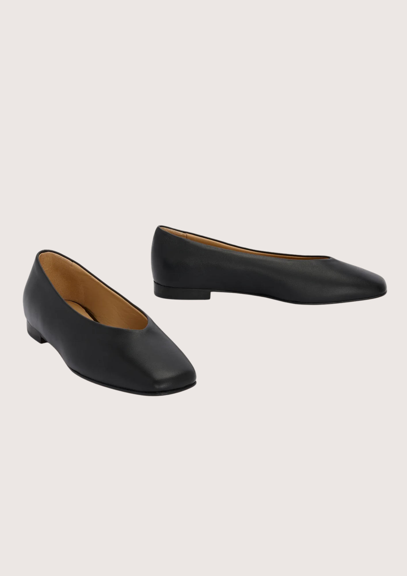 Black leather ballet flats with squared toe and v shaped toe shape from donna lei 