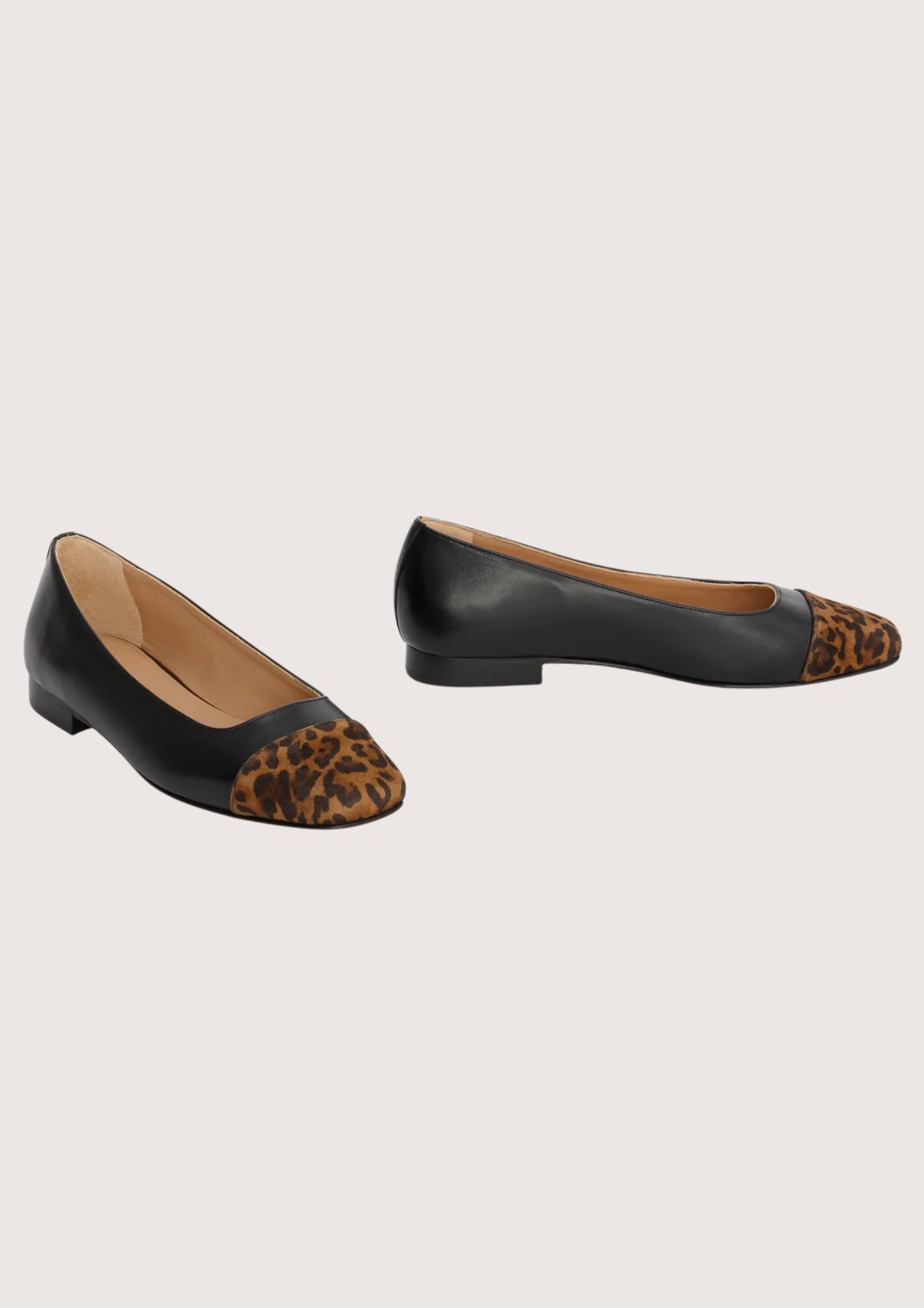 black leather pumps with animal print suede toe cap  side view