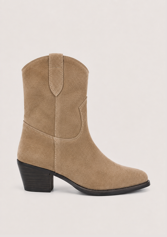 A single tan suede western-style ankle boot with a black block heel, shown in profile against a light gray background.