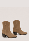 A pair of women's mid-calf boots in tan suede, featuring a stacked block heel and a pull tab at the back of the collar, shown against a light beige background.