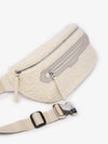 cream sherpa belt bag with 2 zipped pockets close up