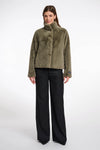 green faux fur short jacket with stand collar from rino and pelle model shot