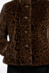 leopard print short faux fur jacket with brown buttons and stand collar close up