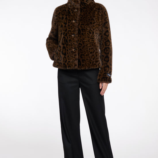 leopard print short faux fur jacket with brown buttons and stand collar model shot
