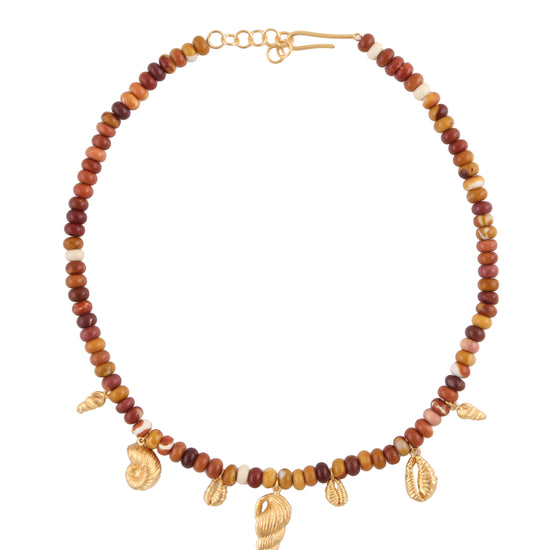 beaded necklace with small gold shell charms