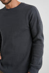 black waffle knit o neck jumper  close up