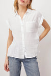 White short sleeved muslin shirt with front patch pocket classic collar and rolled grown on short sleeves