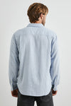 light blue shirt with chest pocket and curved hem rear view 