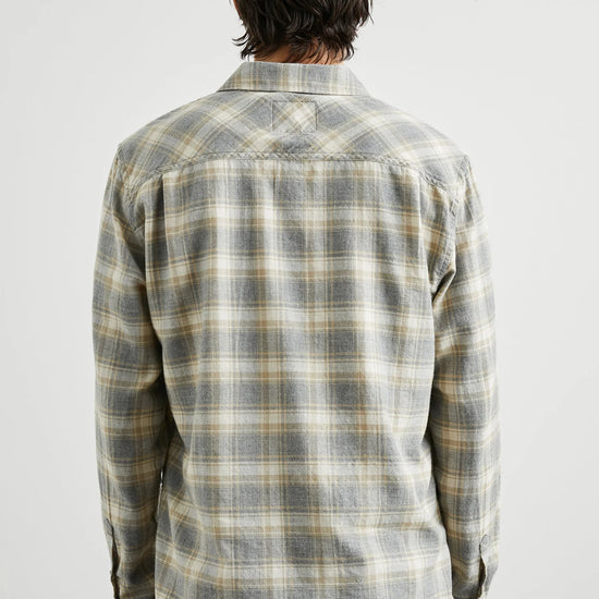 grey check shirt with chest pocket and curved hem  rear view 