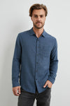 blue shirt with chest pocket and curved hem 