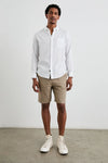 white shirt with chest pocket and curved hem