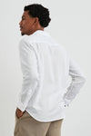 white shirt with chest pocket and curved hem rear view 