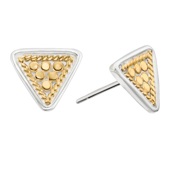 Triangular gold and silver earrings on a white background